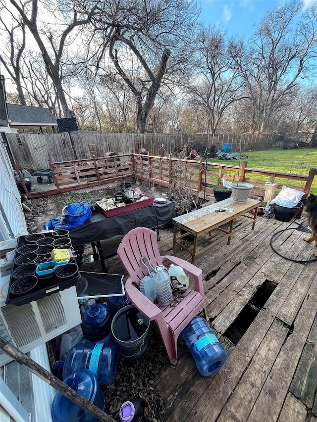 deck featuring a fenced backyard