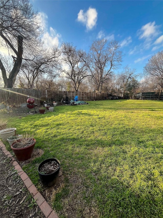 view of yard with fence