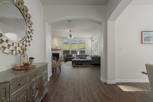 hallway with dark hardwood / wood-style floors