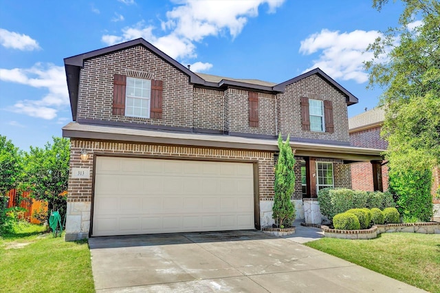 view of front of property with a garage and a front lawn