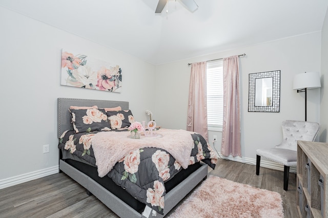 bedroom with hardwood / wood-style flooring and ceiling fan