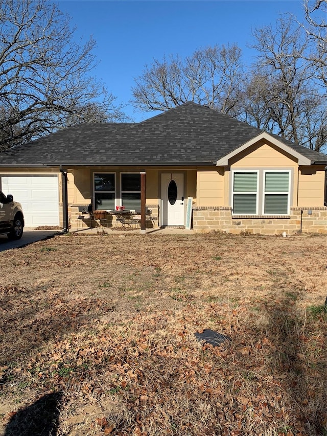 ranch-style house with a garage