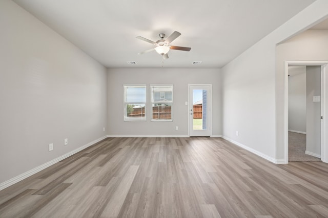 unfurnished room featuring ceiling fan and light hardwood / wood-style floors