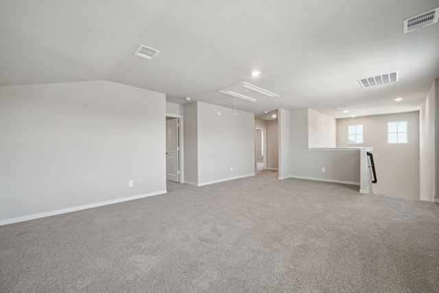 basement featuring light carpet