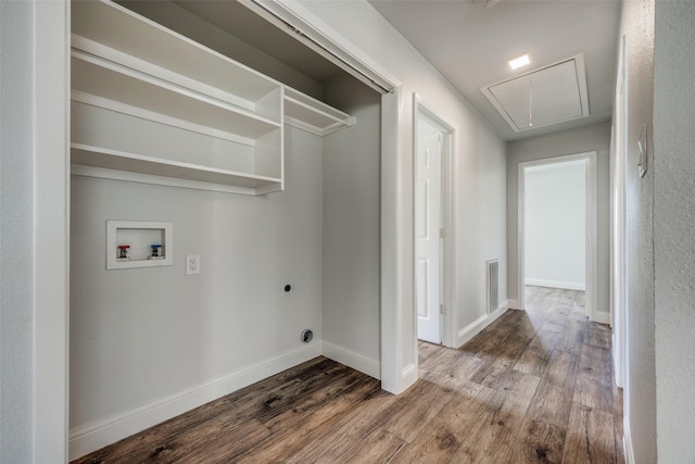 laundry area featuring washer hookup, hardwood / wood-style floors, and electric dryer hookup