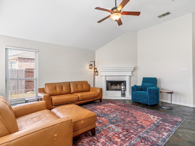 living room featuring lofted ceiling and ceiling fan