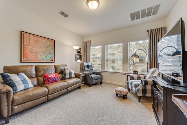 living room featuring light colored carpet