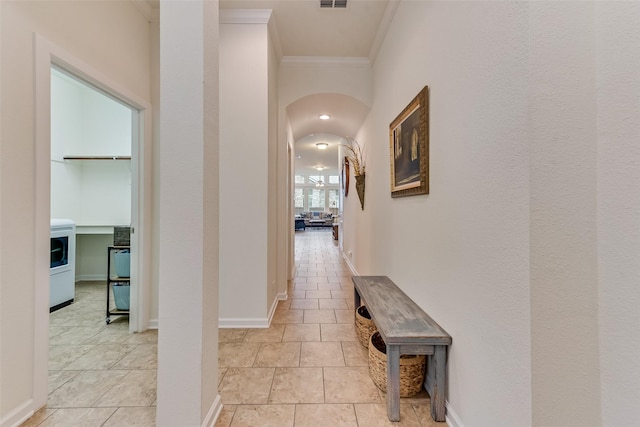 hallway featuring ornamental molding