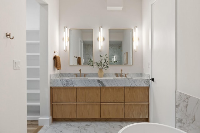 4330 Dickason Ave Unit 201, Dallas, TX 75219 - full bath featuring marble finish flooring, double vanity, and a soaking tub
