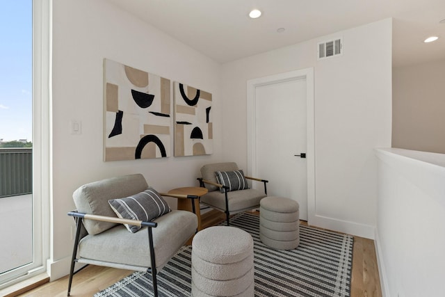 4330 Dickason Ave Unit 201, Dallas, TX 75219 - sitting room featuring wood finished floors and recessed lighting