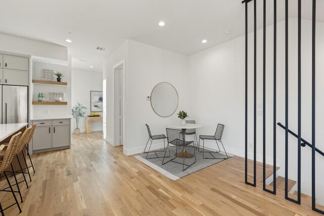 dining area with light hardwood / wood-style flooring