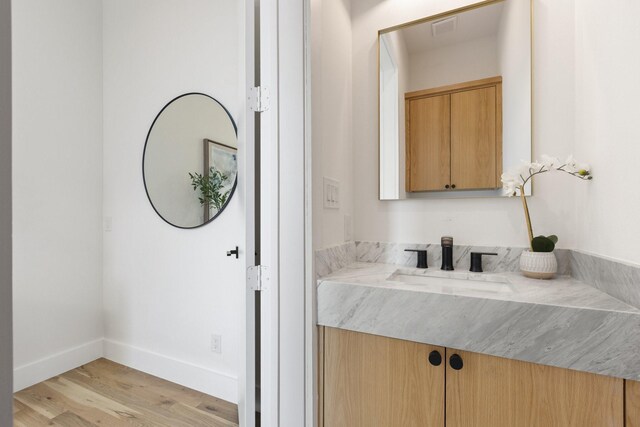 bedroom featuring access to outside and light hardwood / wood-style floors