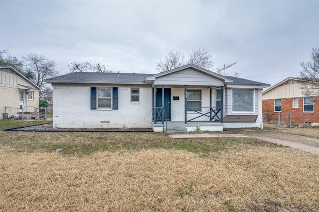 view of front of house featuring a front yard and a porch