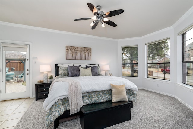 tiled bedroom with ornamental molding, access to outside, and ceiling fan