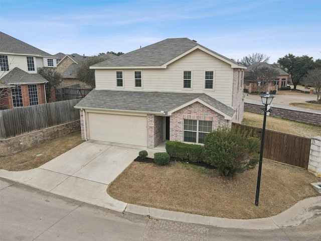 view of front of property with a garage