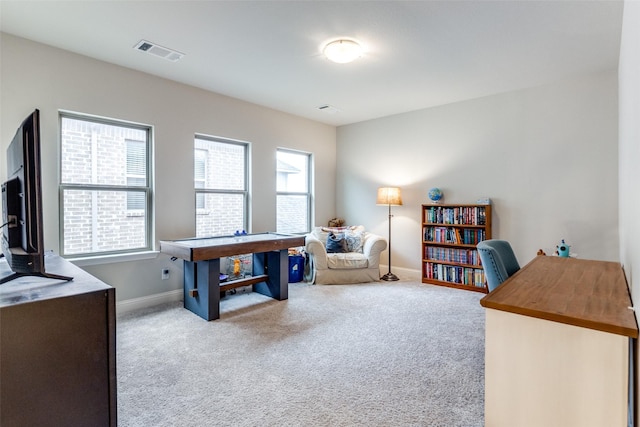 office space with light colored carpet