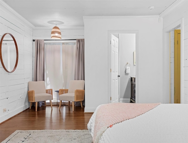 bedroom with crown molding and dark hardwood / wood-style floors