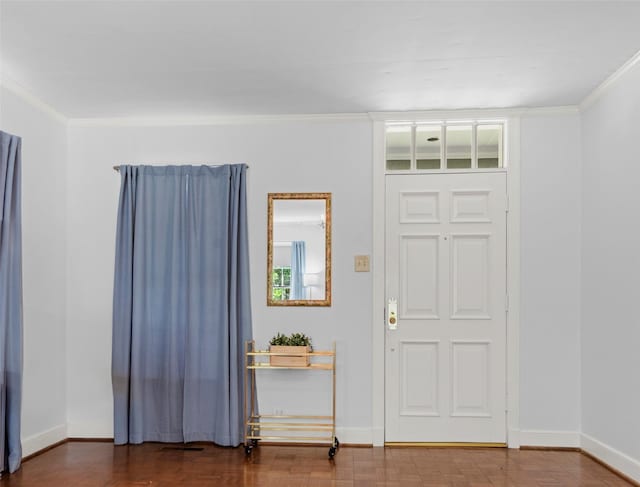 entrance foyer featuring crown molding