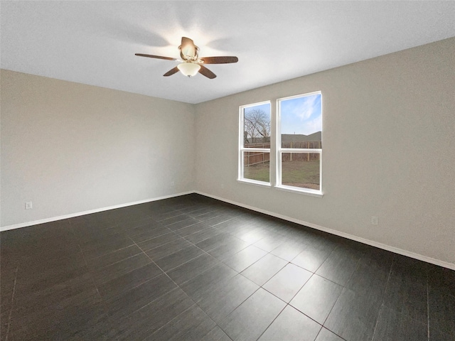 empty room featuring ceiling fan