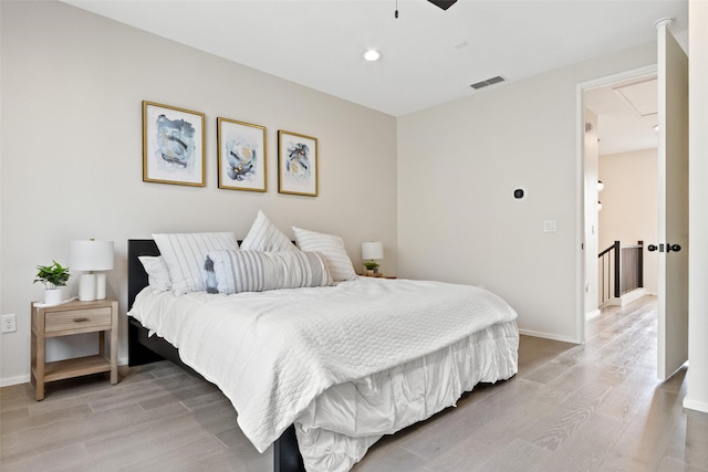 bedroom with light wood-type flooring