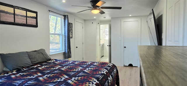 bedroom featuring ceiling fan and light wood-type flooring