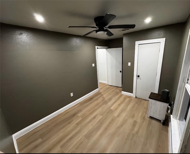 732 Ravine St, Emory, TX 75440 - unfurnished bedroom featuring light wood-type flooring, a ceiling fan, and recessed lighting