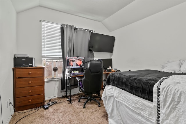 bedroom featuring vaulted ceiling and light carpet