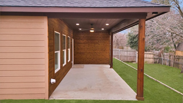 view of patio featuring ceiling fan