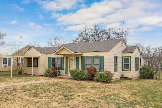 ranch-style home with a front yard