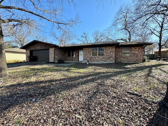 single story home featuring a garage