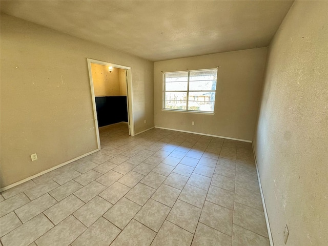 view of tiled empty room