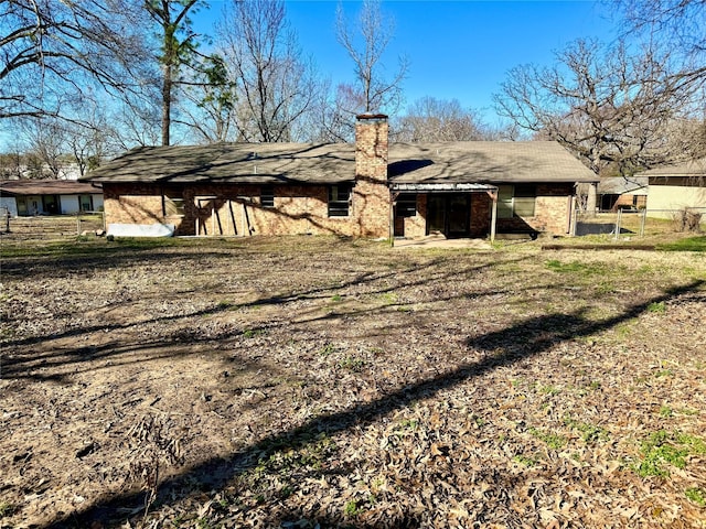 back of house with a yard