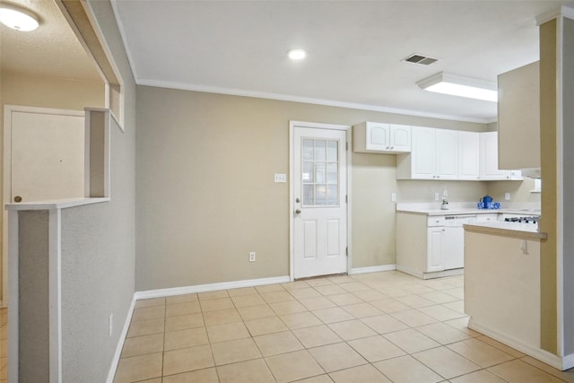 kitchen featuring light tile patterned floors, dishwasher, ornamental molding, white cabinets, and kitchen peninsula