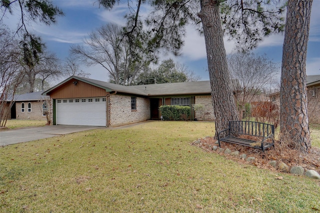 ranch-style house with a garage and a front yard