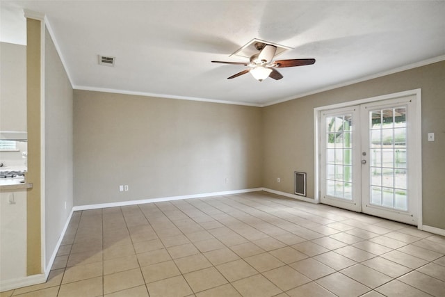 empty room featuring crown molding, ceiling fan, and light tile patterned flooring