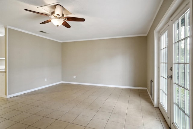 tiled empty room with crown molding and ceiling fan