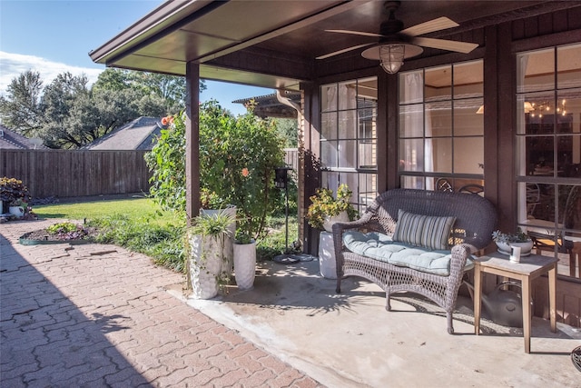 view of patio featuring outdoor lounge area and ceiling fan