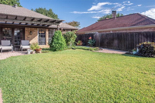 view of yard with a patio area