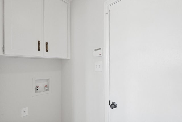 laundry room featuring cabinets and hookup for a washing machine