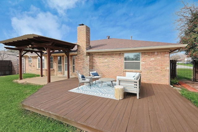 deck with a lawn and a patio