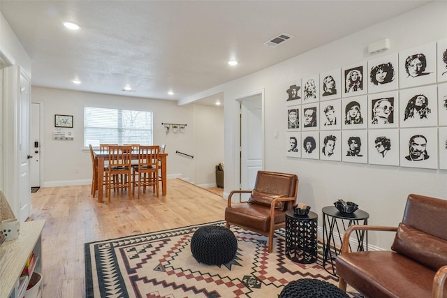 dining room with light wood-style flooring, recessed lighting, baseboards, and visible vents