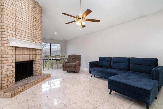 living room with ceiling fan, high vaulted ceiling, and a brick fireplace