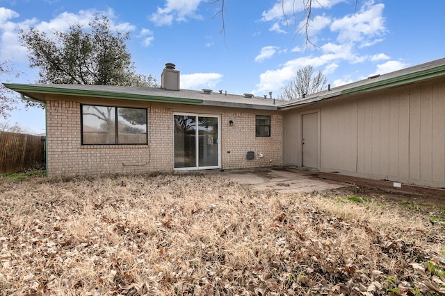 back of property featuring a patio