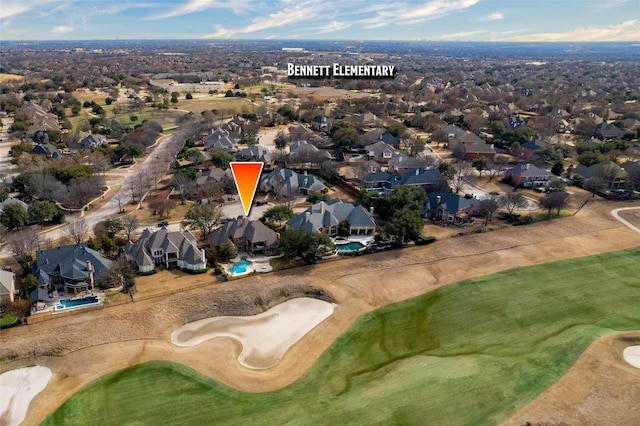 drone / aerial view with a residential view and view of golf course