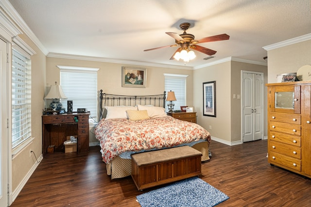 bedroom with ornamental molding, ceiling fan, and dark hardwood / wood-style flooring