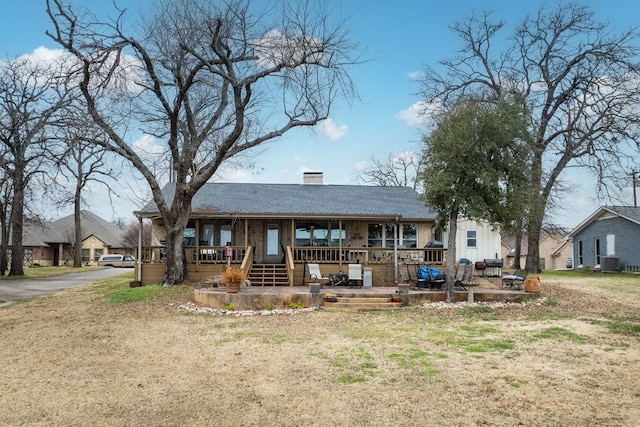 view of front of home featuring central AC and a porch