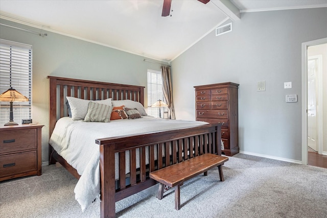 bedroom with crown molding, lofted ceiling with beams, and light carpet