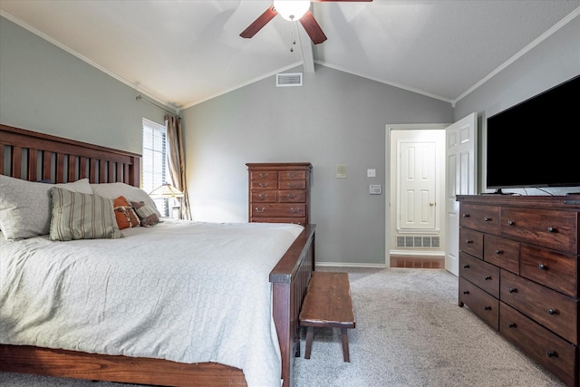 carpeted bedroom featuring crown molding, lofted ceiling with beams, and ceiling fan