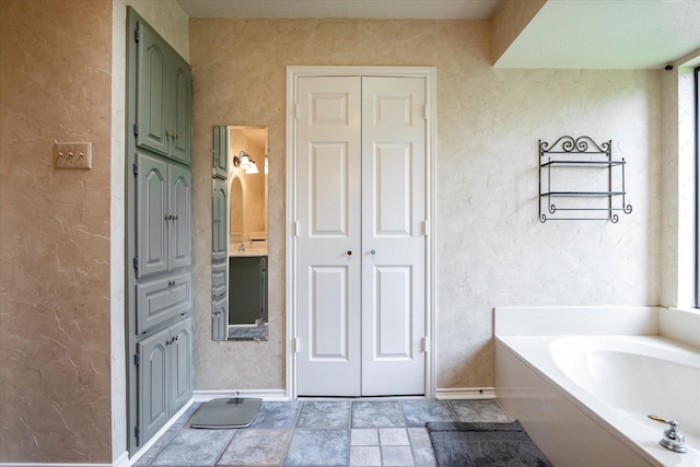 bathroom with a washtub