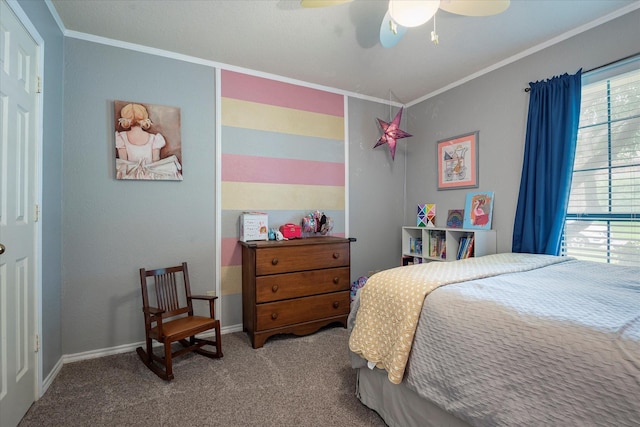 bedroom featuring ornamental molding, carpet floors, and ceiling fan